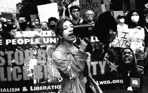 Protester leading the march for justice in Boston.