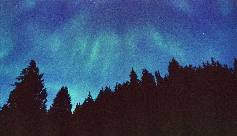 Exposures that capture less light can have more defined northern light streaks but also result in grainier, thinner film.