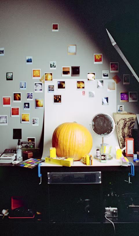 A tiny home studio made with a sheet of white cardboard, studio lights, and a few props could be enough to test the film.