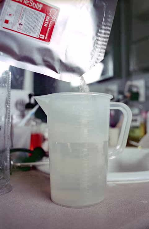 You can pour your developer powder before or after you place TCS-1000 into the pitcher (just make sure that there’s enough space left for the displaced water not to end up on your counter). For blix “Part B,” you’ll have your TCS-1000 in the container actively mixing.