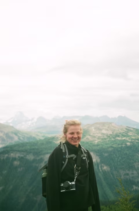Taking in the glorious view after a hard hike, on top of Mount Bourgeou.
