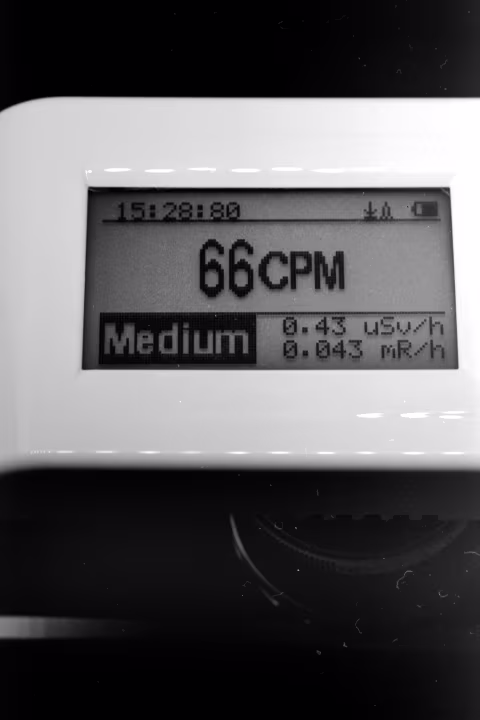 Geiger counter reading off the Zuiko 40 mm f/1.4 thoriated lens.
