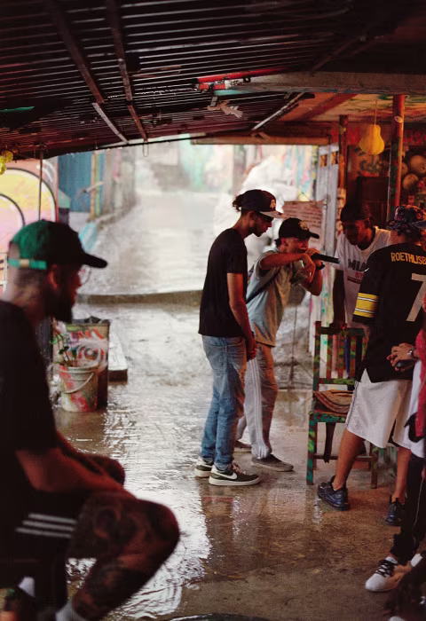 Local rap gang performing under a corrugated iron canopy during a mighty thunderstorm. Shot on Kodak Portra 400 with Minolta XD-7 and MD Rokkor 50mm f/1.4.
