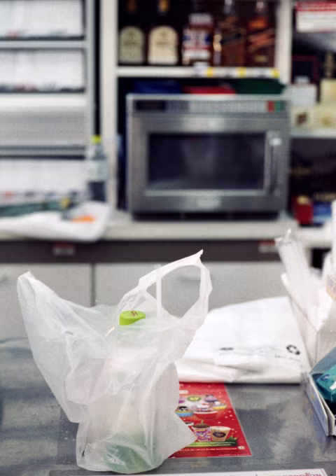 At 7/11 employees are trained to give a small plastic bag and a packaged straw with every drink purchase.