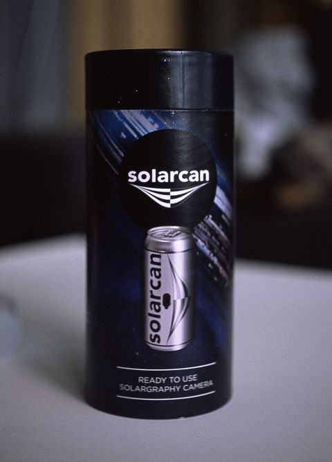 Solarcan, a solargraphy camera in its cardboard packaging.