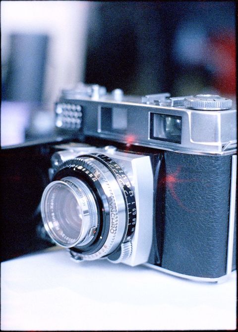 Unfolded Kodak Retina IIIC with a 32mm-thread skylight filter mounted.