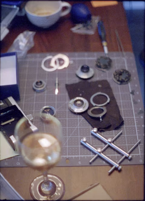 Lens disassembly on Vitessa A. This lens does not have helicoid focusing system (it uses bellows) but its leaf shutter components are very delicate.
