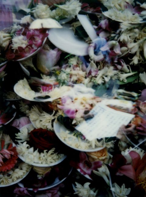 “Prayers and Offerings” — a double-exposed photograph from the Lungshan Temple in Taipei. Instax Mini 90.