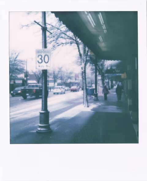 Polaroid Sun 660’s automatic flash added a bit of illumination to the otherwise dark area under the awnings.