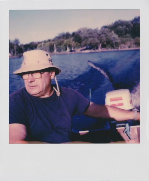 Polaroid SX-70 is a large, loud instant film SLR camera. An even louder boat motor and my dad’s laser focus on not getting us drowned helped me get a candid portrait where he isn’t looking at the camera directly or trying to pose for the picture.