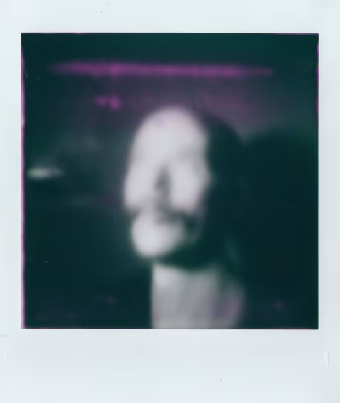 A portrait of me looking like Skeletor on Instax Square Monochrome with Gingerbread 2.