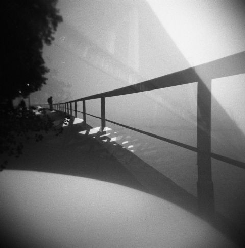 A double exposure of a famous Porto bridge – Ponte da Arrabida and the Douro river margin. 