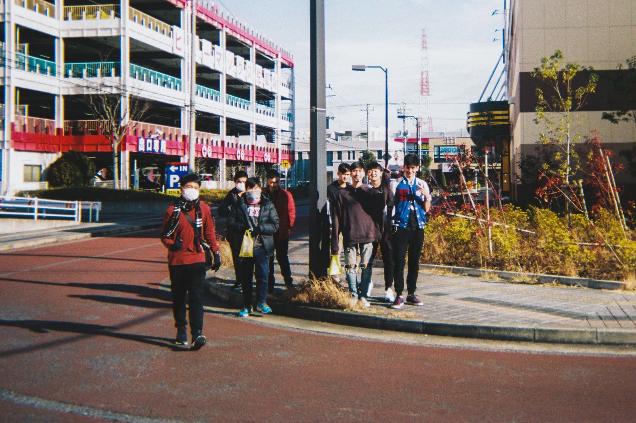 “Boys.” Narita, Japan. Shot with Fujifilm Simple Ace 400 Disposable.