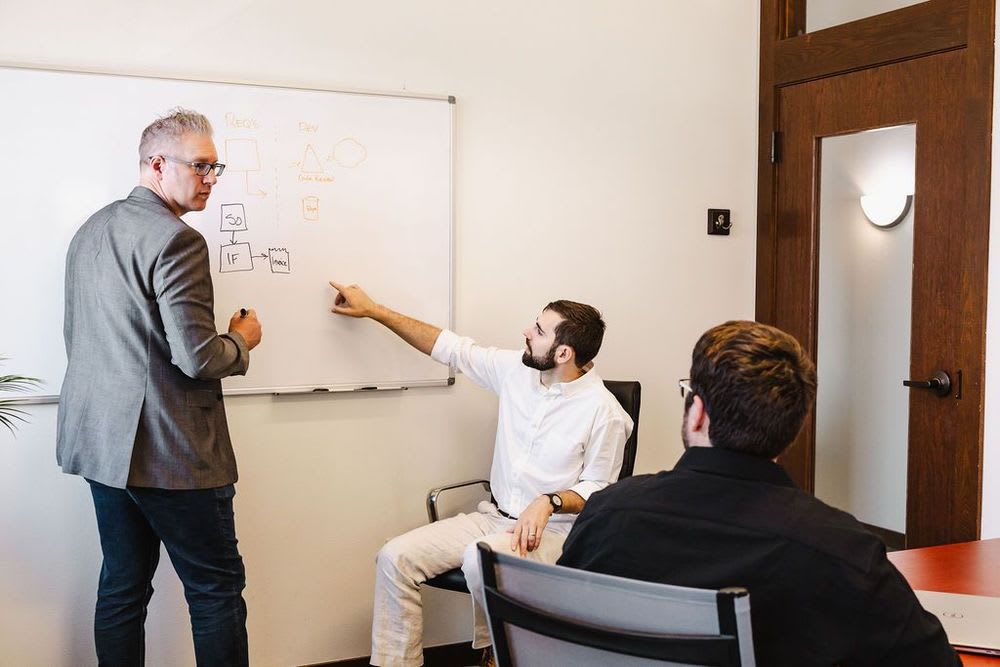 A speaker addresses a group, sharing insights and information during a presentation.