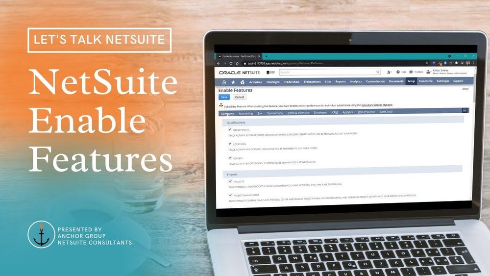 NetSuite Enable Features title with an open laptop screen.