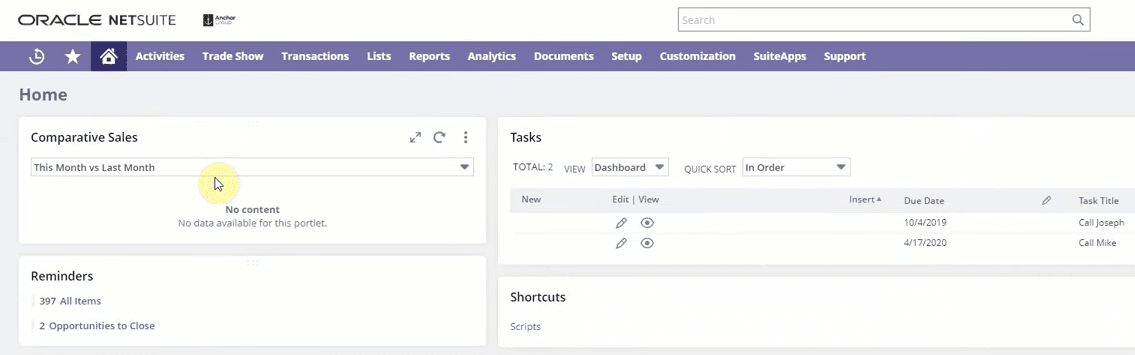 NetSuite home dashboard purple color theme.