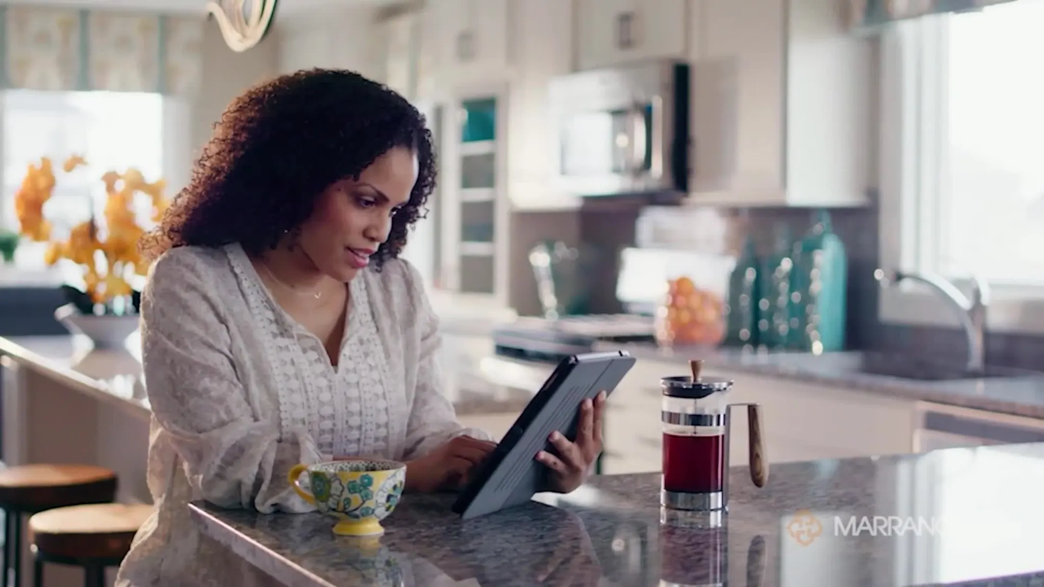 Family enjoying a modern Marrano home interior in Buffalo and Rochester, New York.