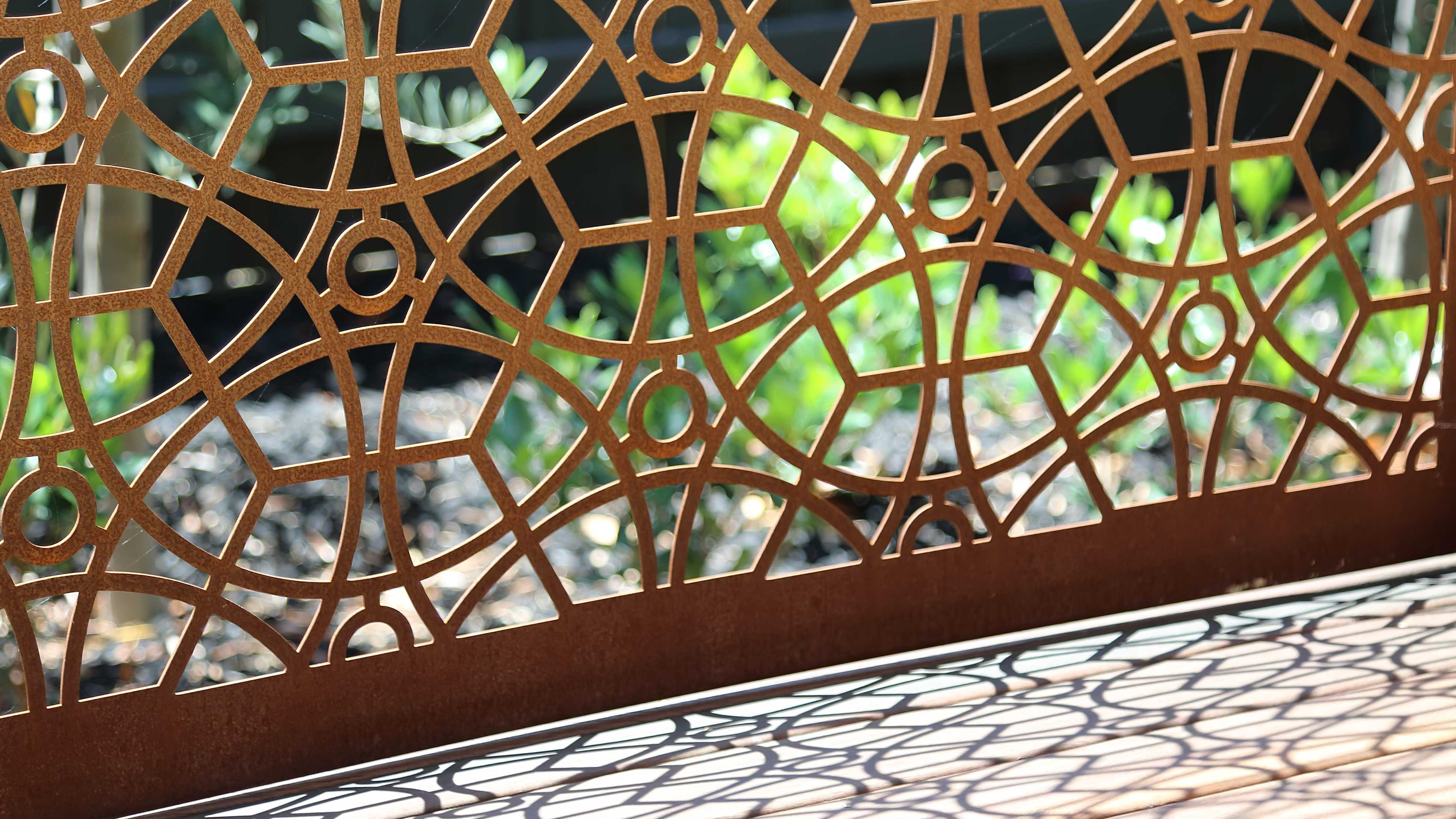 Detail of a decorative panel railing with a geometric design