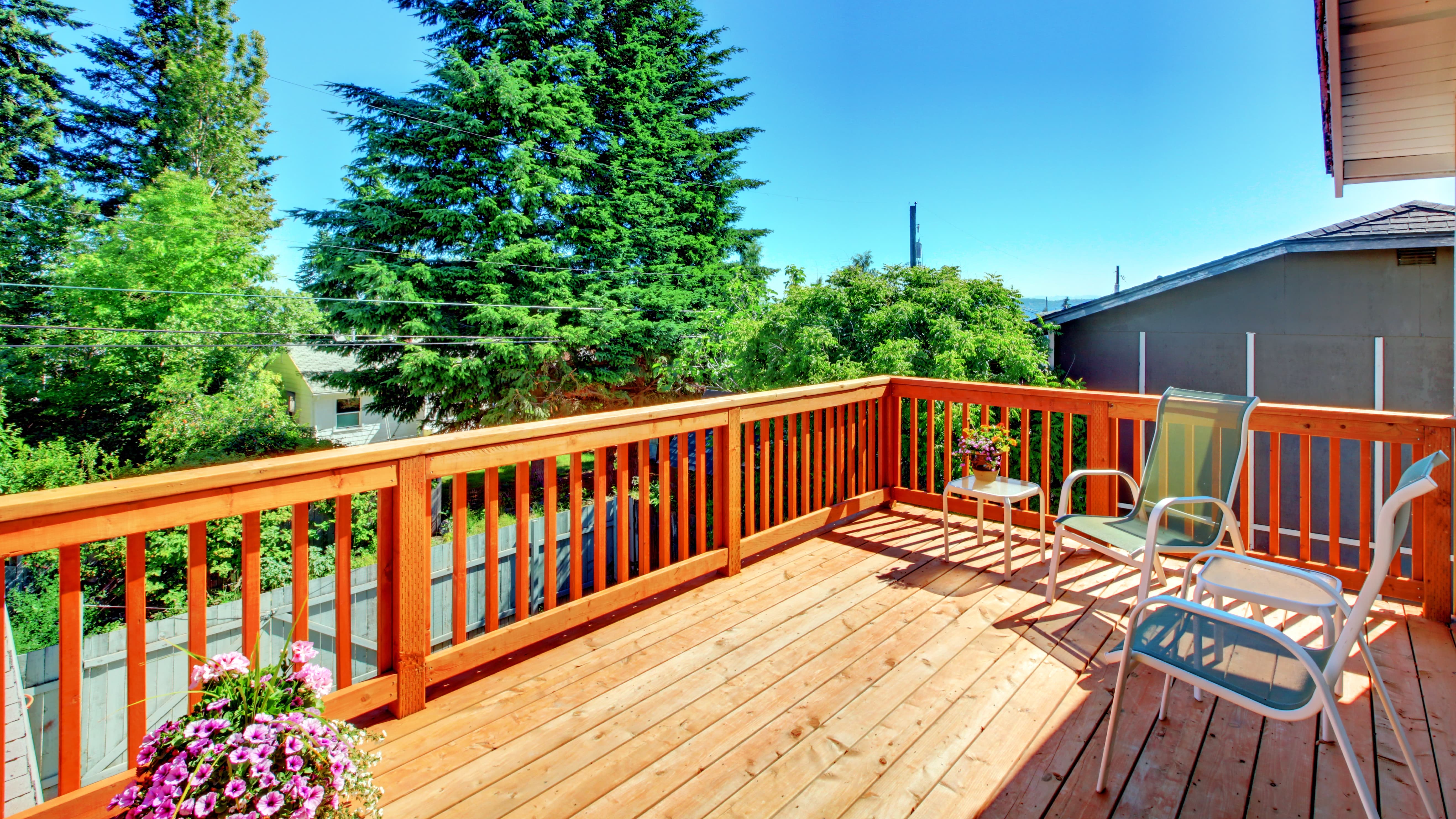 Raised deck with stained wood railing