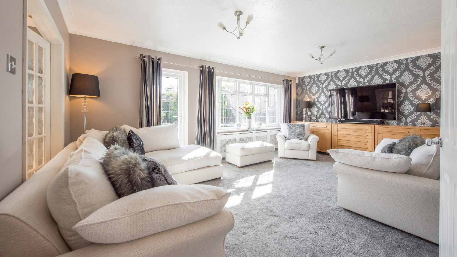 A living room with a carpet