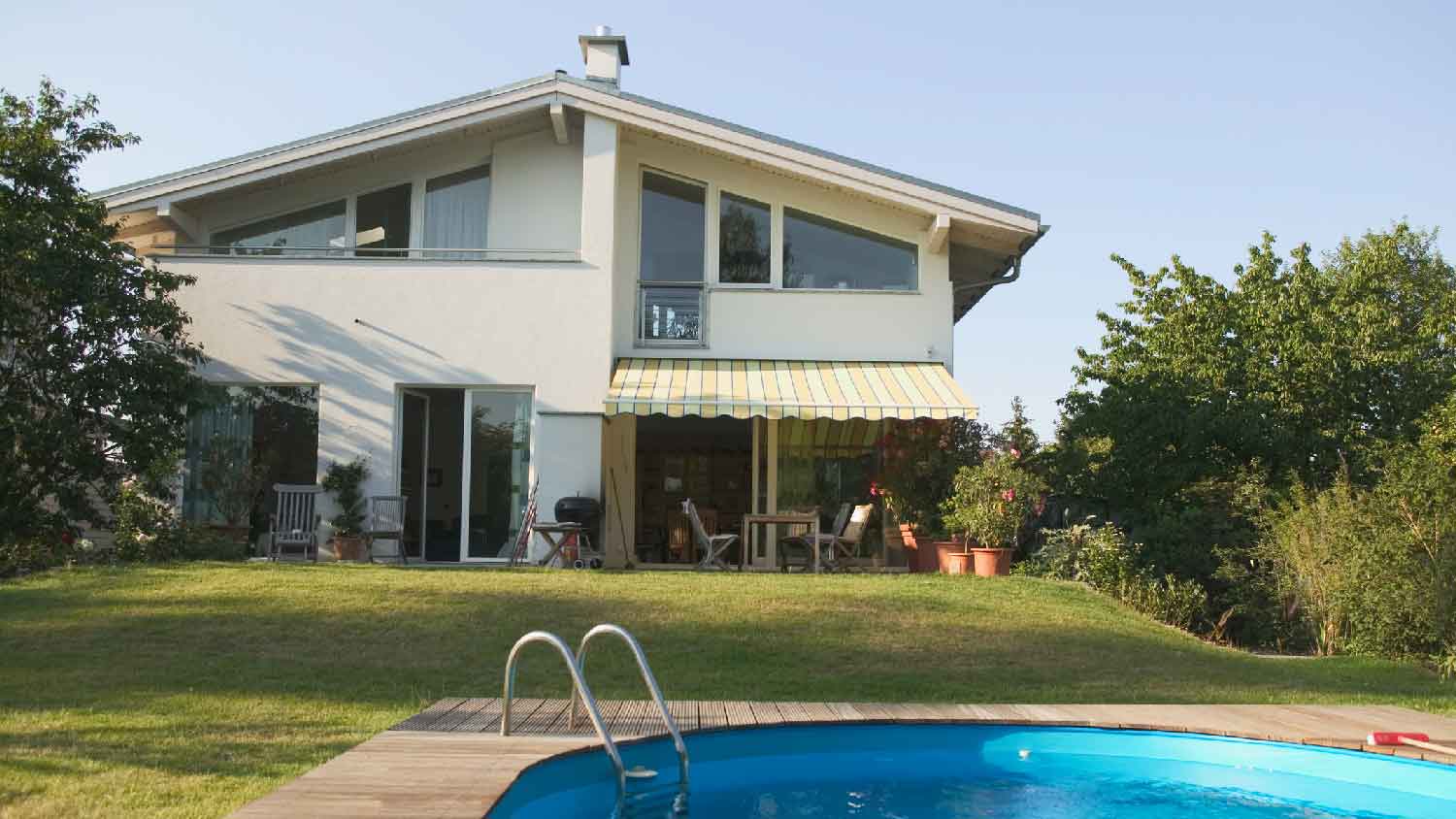 The backyard of a house with a pool