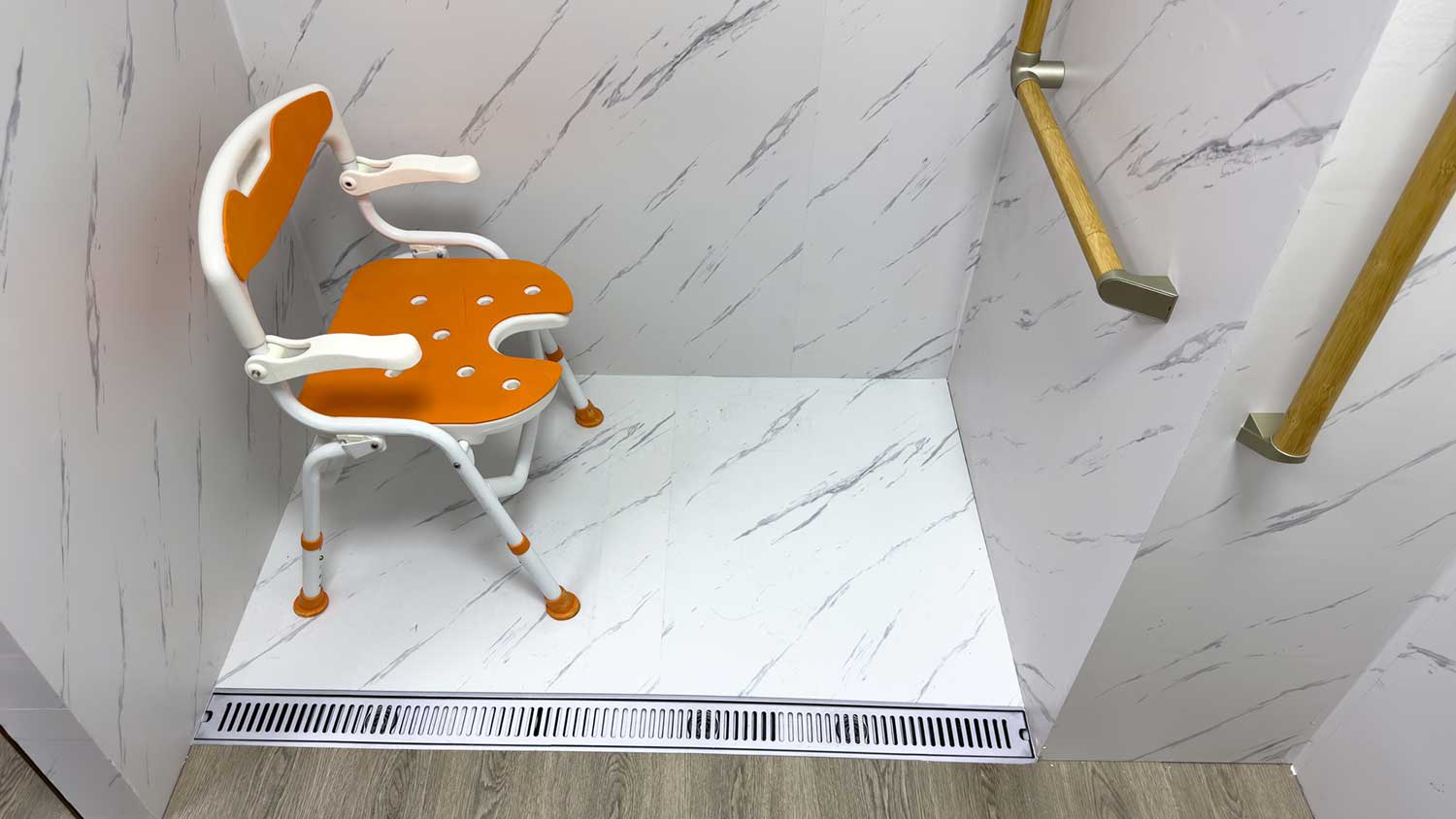 Shower transfer chair in a shower stall