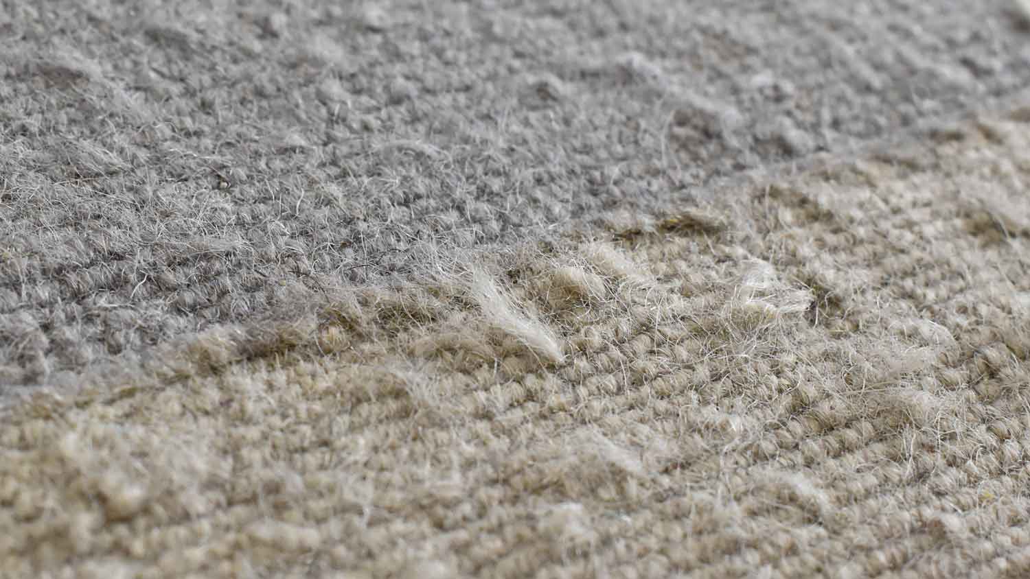 pulled rug threads