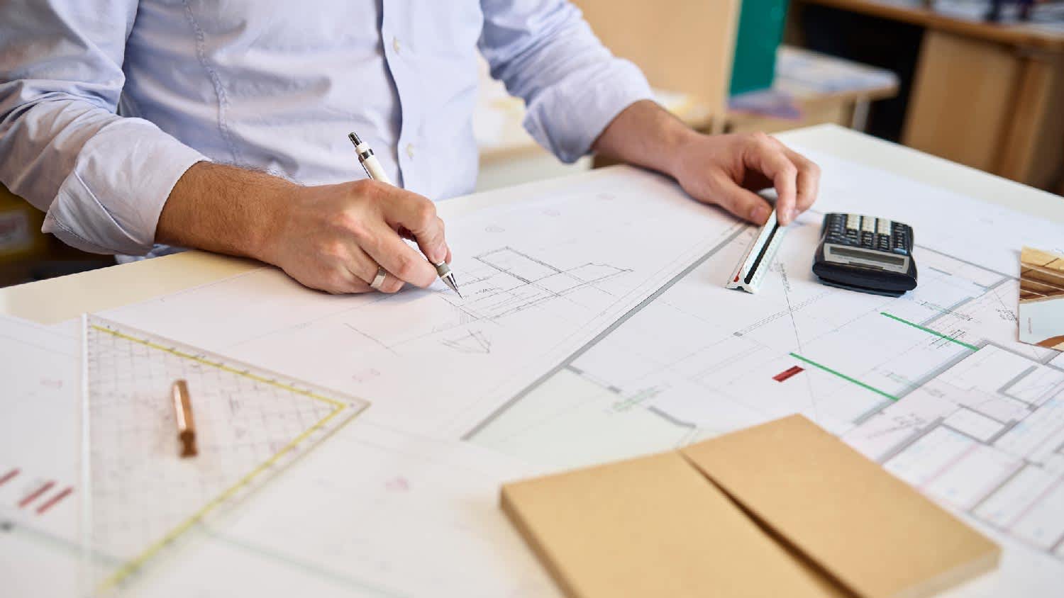 An architect creating a floor plan