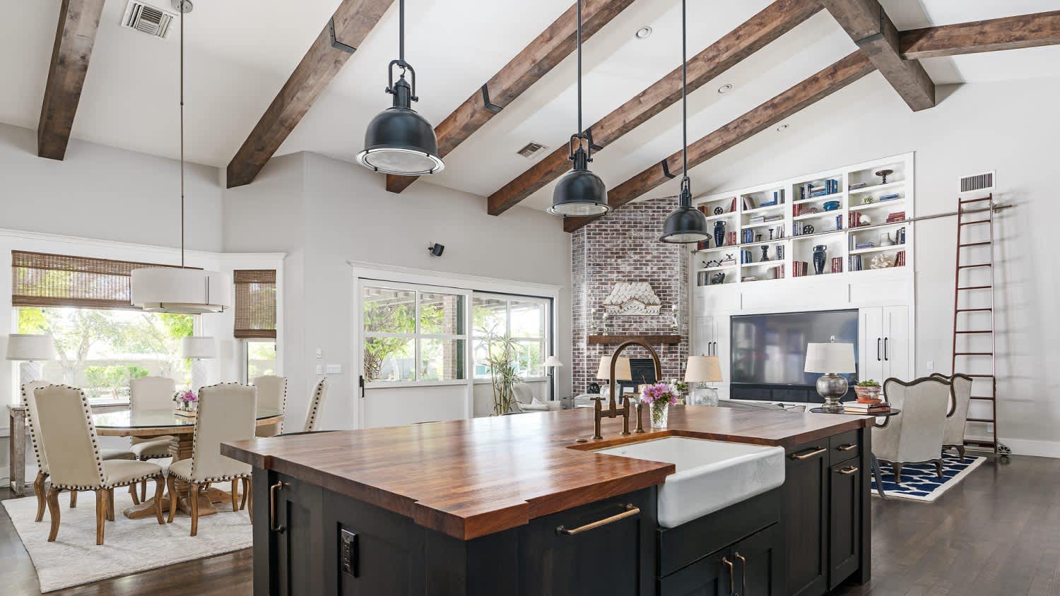 A modern kitchen with faux beams