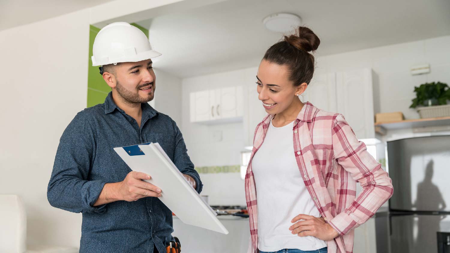 A homeowner discussing with contractor regarding a zoning permit