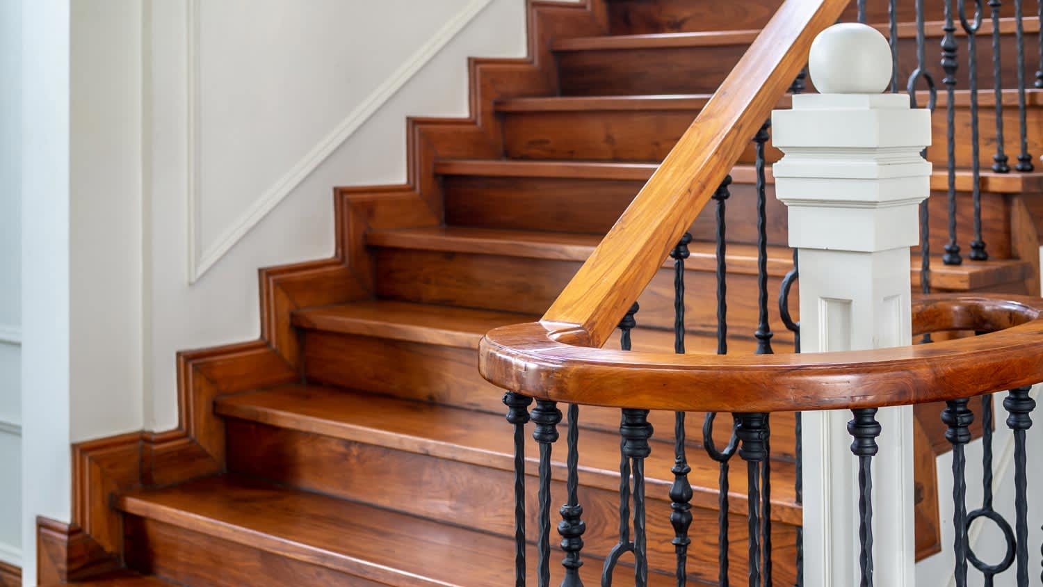A classic wooden stair railing