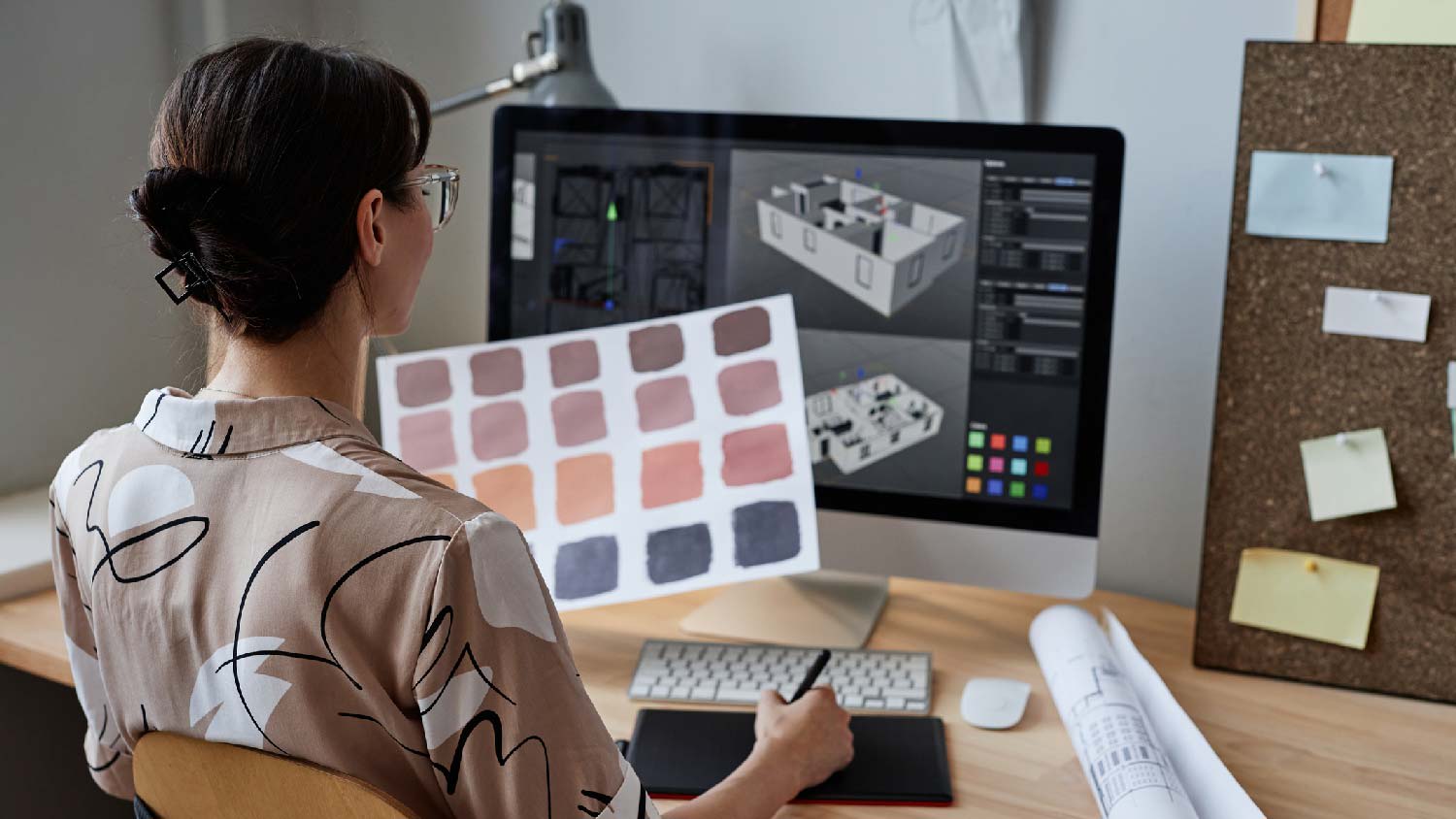 A woman creating a 3d floor plan