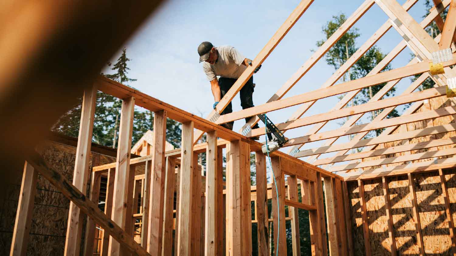 A professional building a house