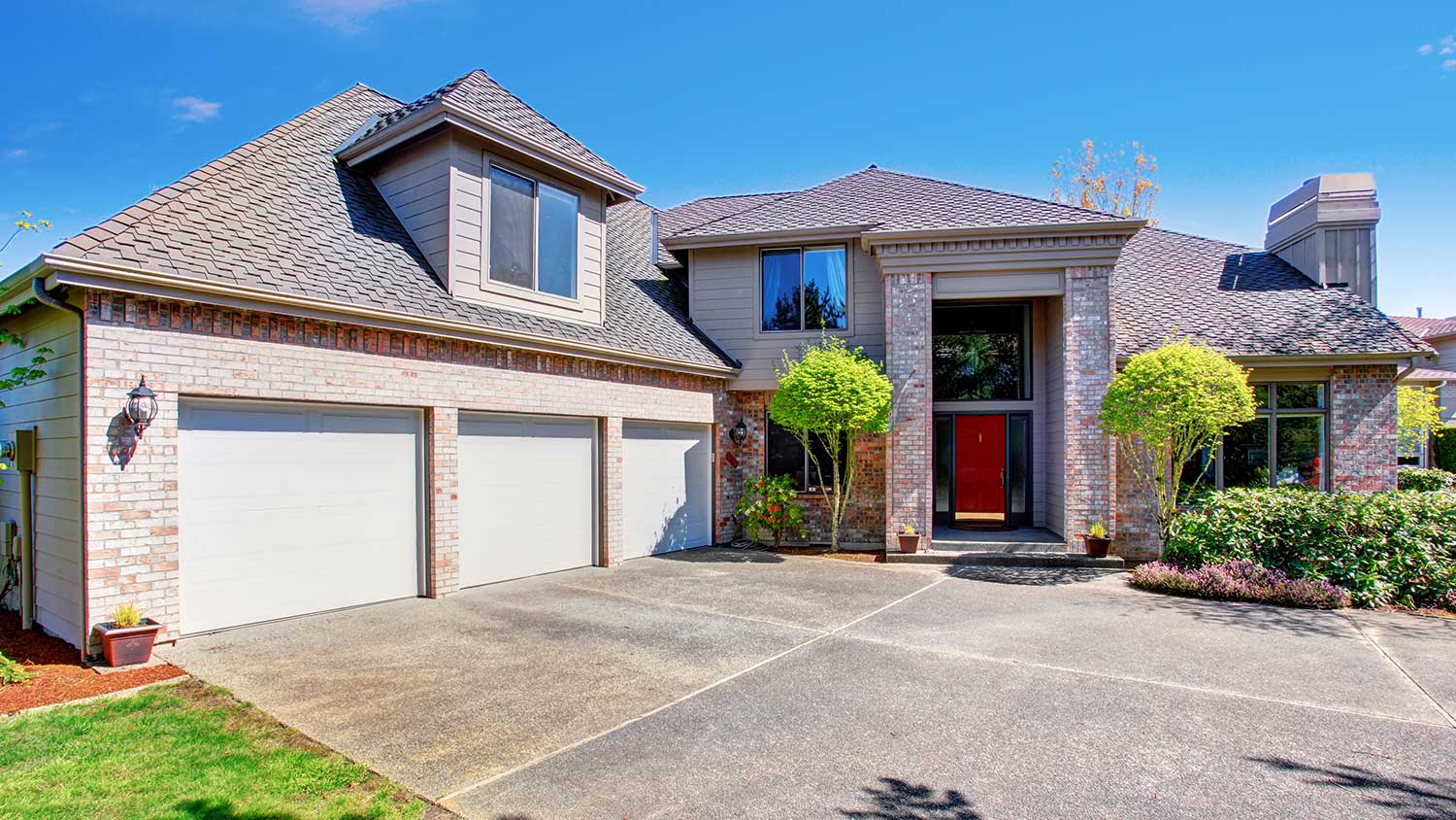 Home with a concrete driveway