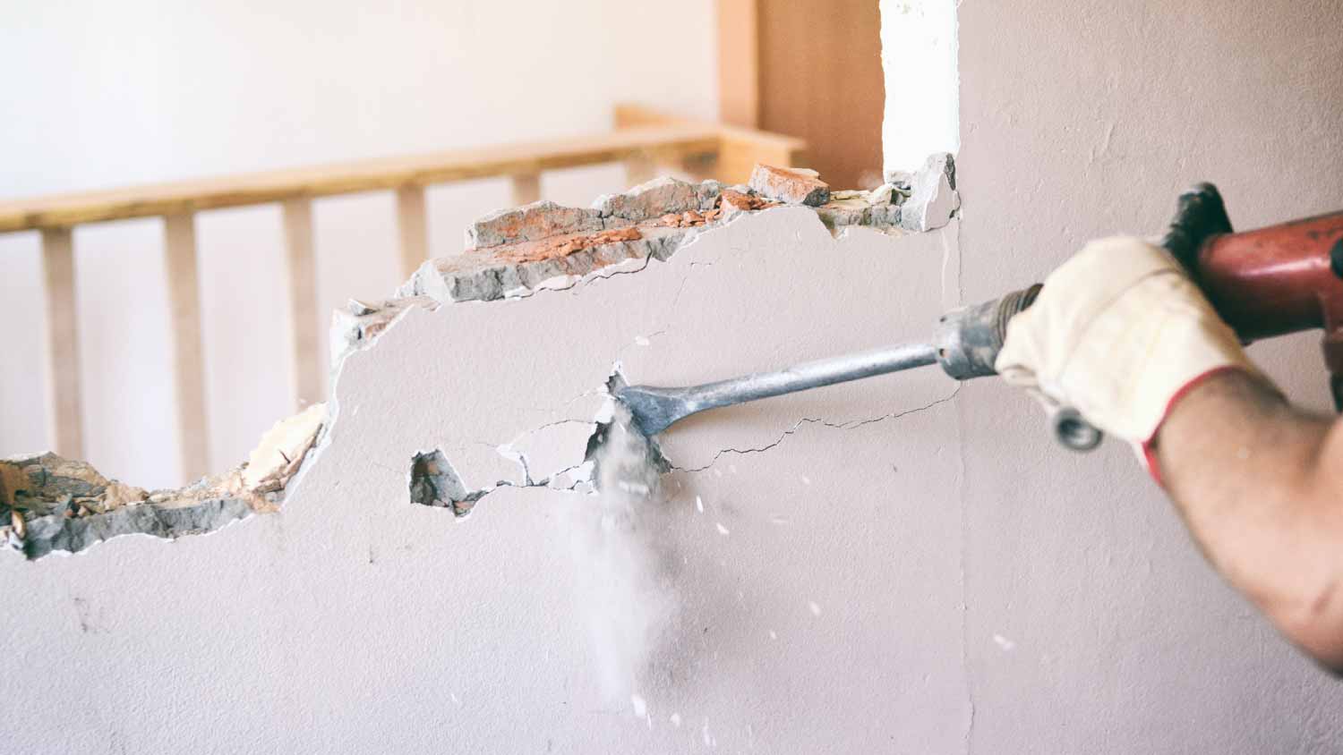 Worker using using jackhammer