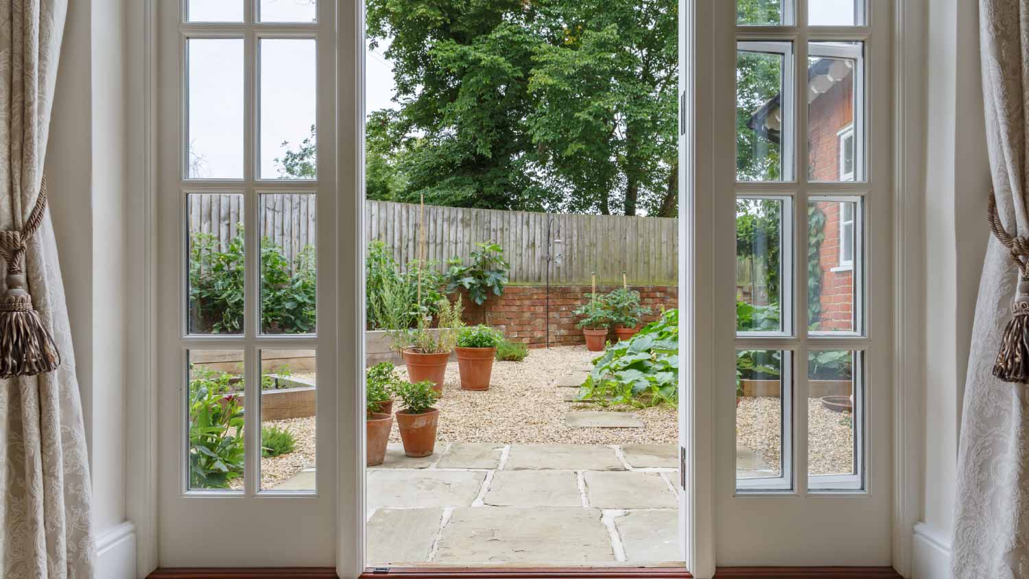 French doors leading to kitchen garden