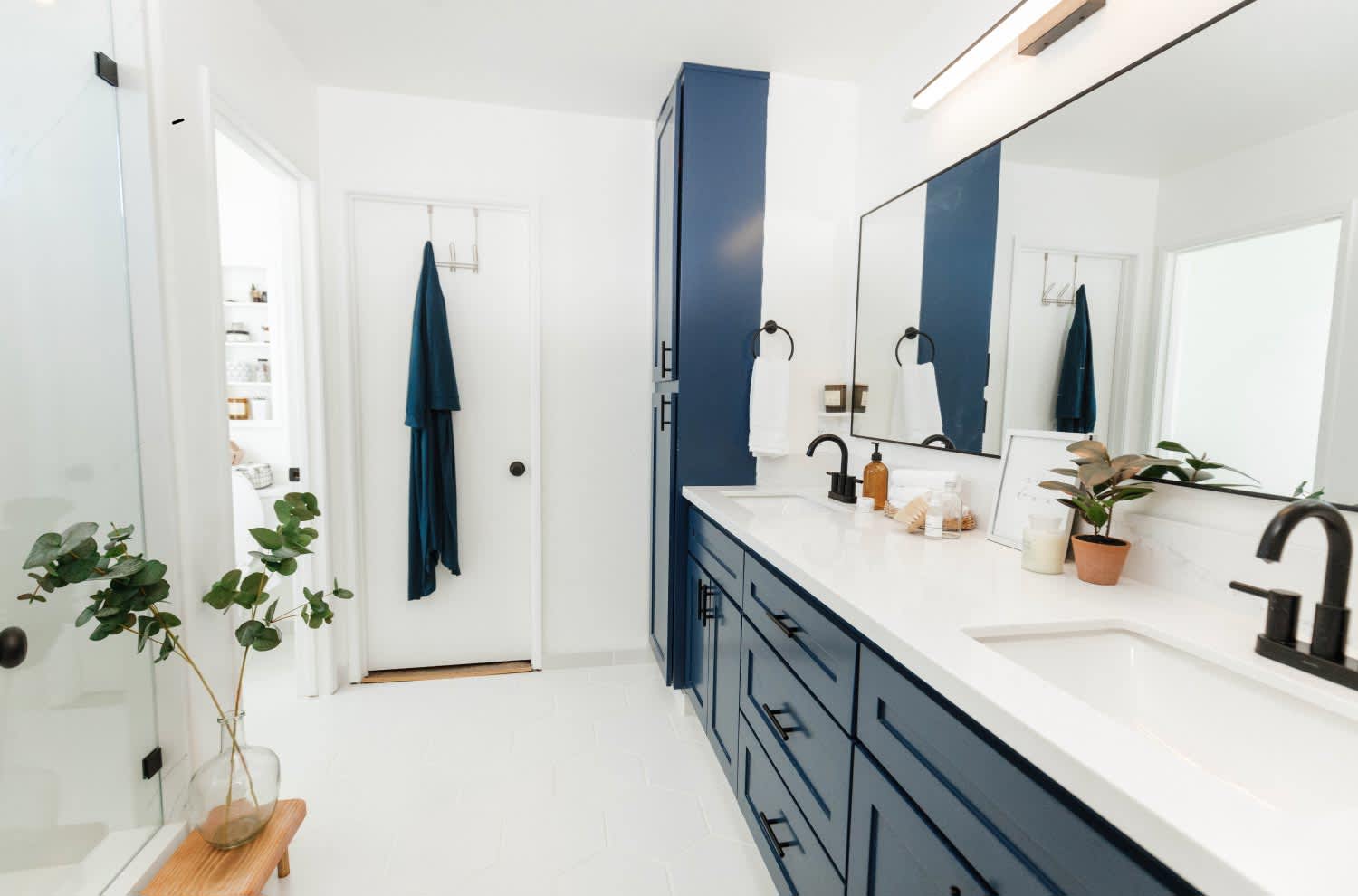 white bathroom with navy details