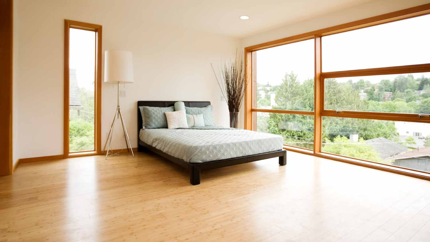 Modern bedroom with bamboo floors