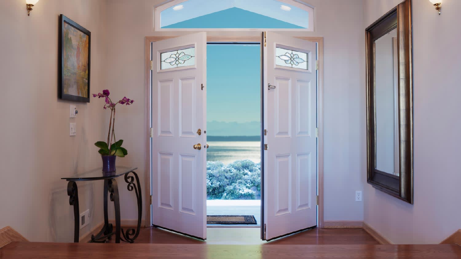 A front door of a house with a door sweep
