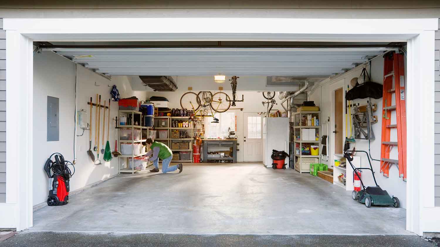 Man tidying up his garage