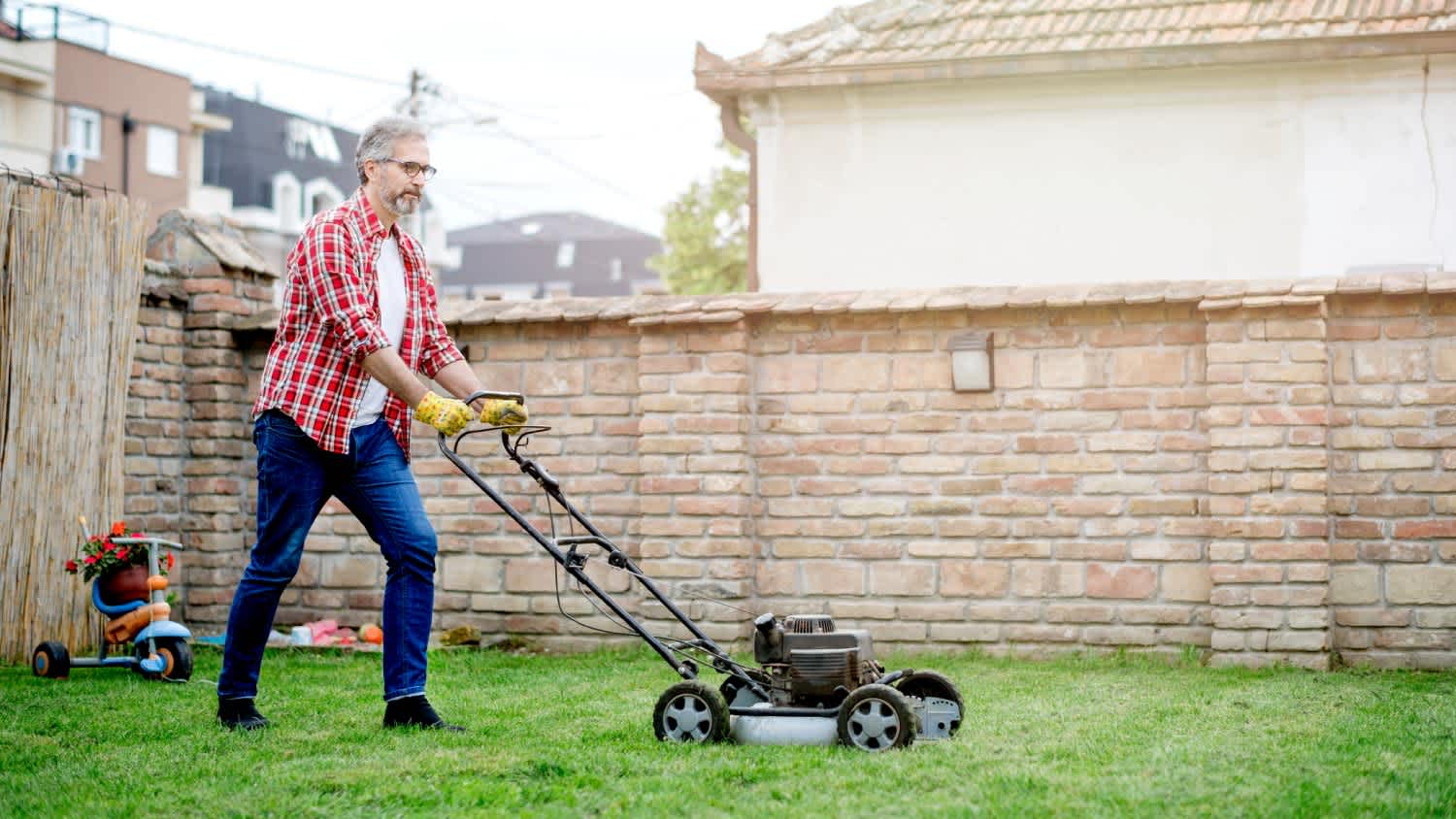 A man mowing the lawn