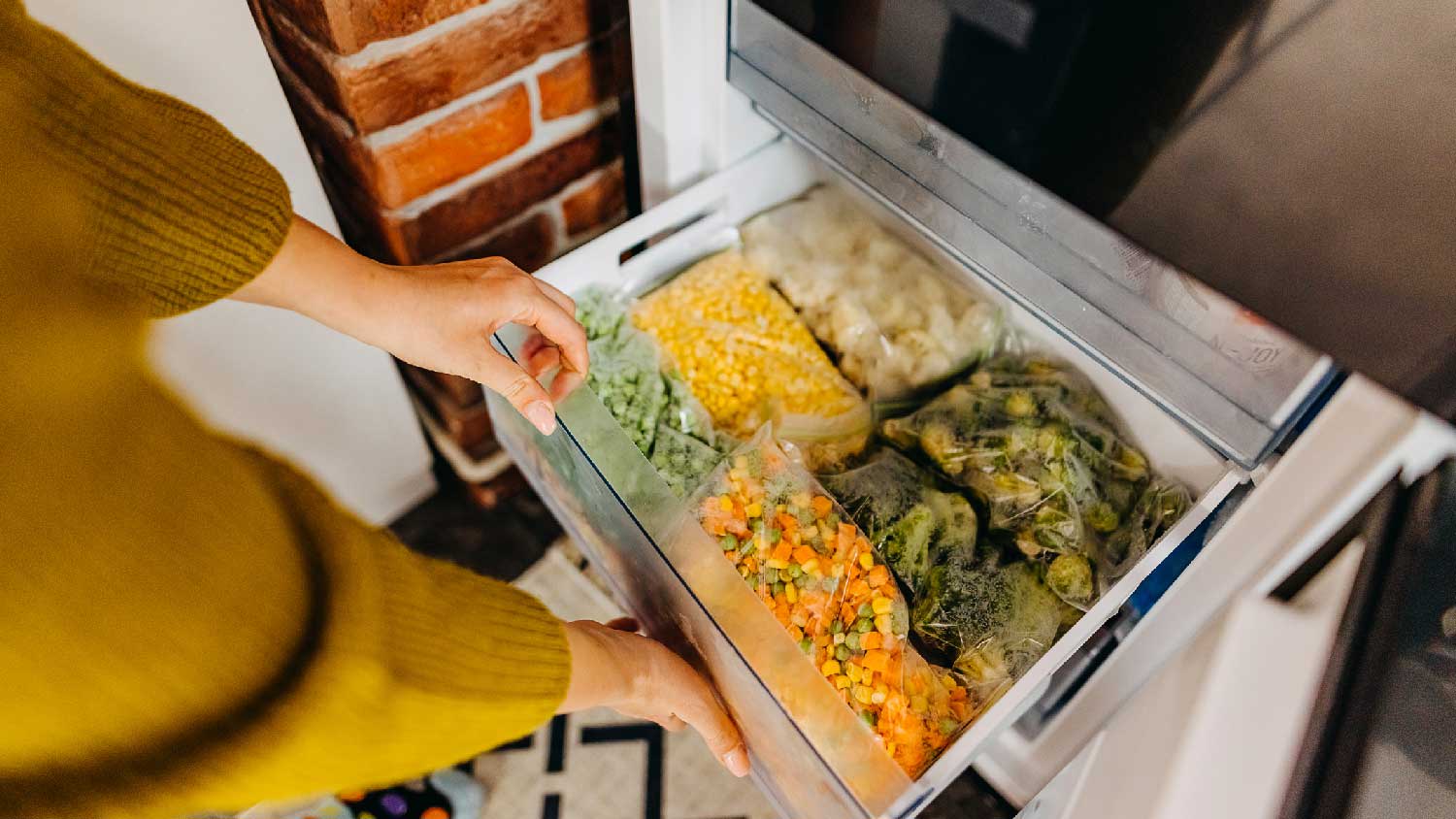 Very well organized frozen mixed vegetables in a freezer