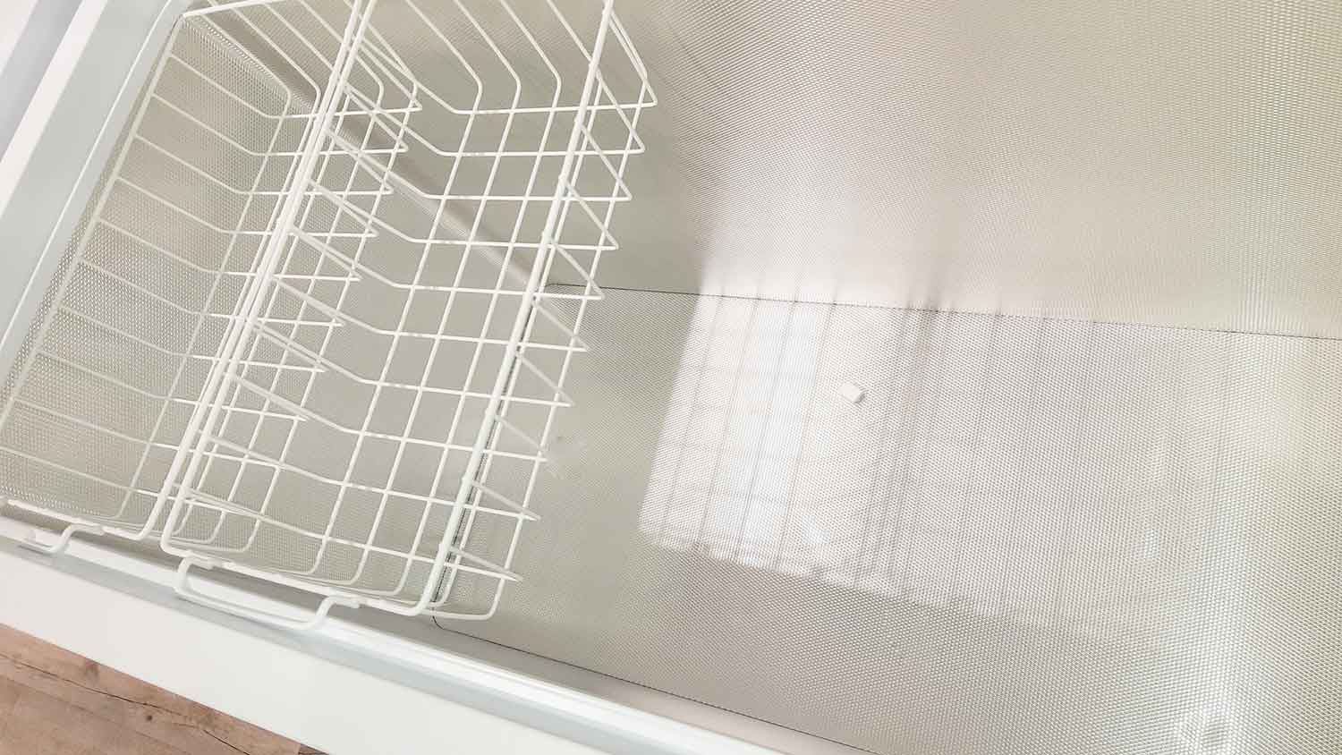 The inside an empty deep freezer