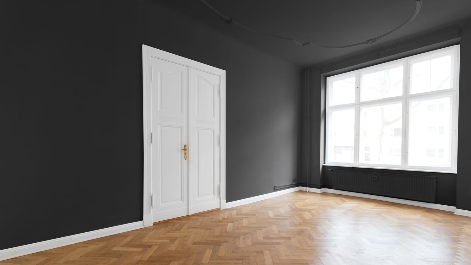 Room with dark gray walls and ceiling