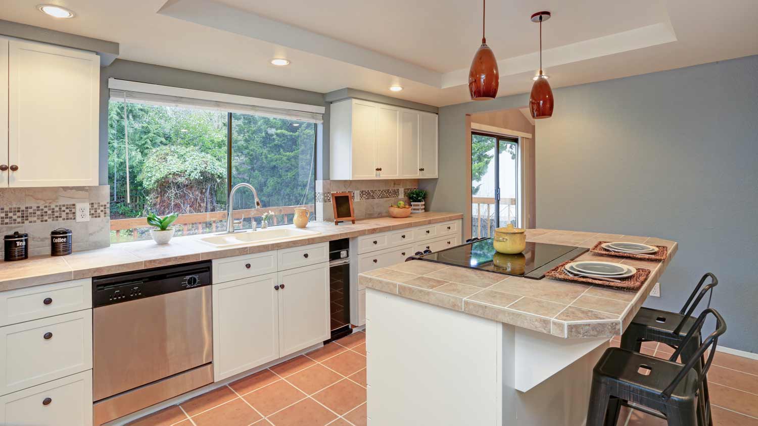 white kitchen with tray ceiling