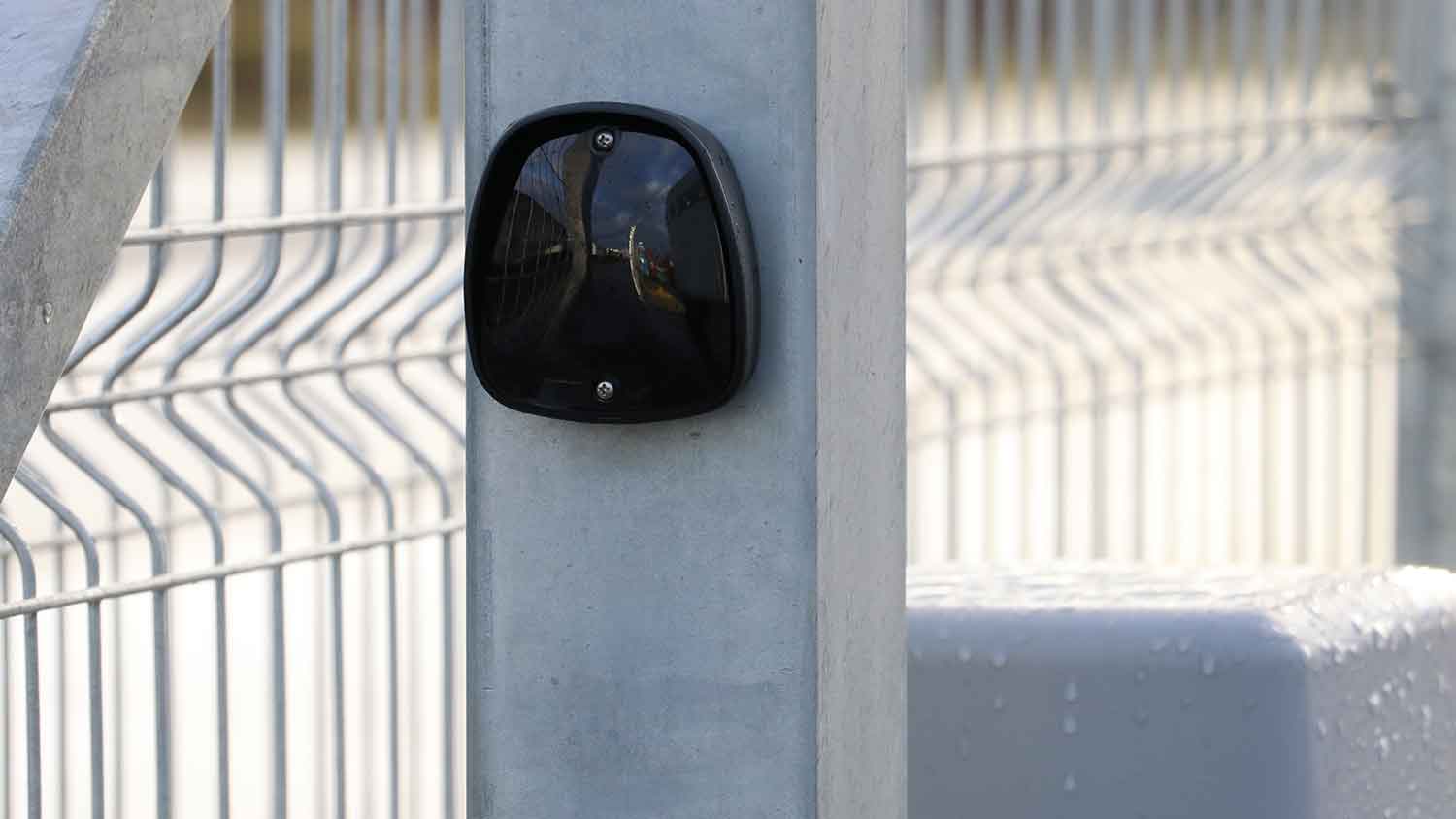Obstacle detection sensor installed on an automatic sliding gate