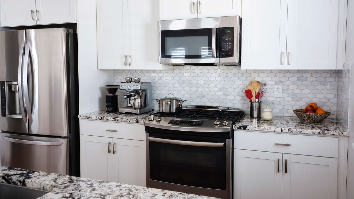 modern kitchen with microwave above stove