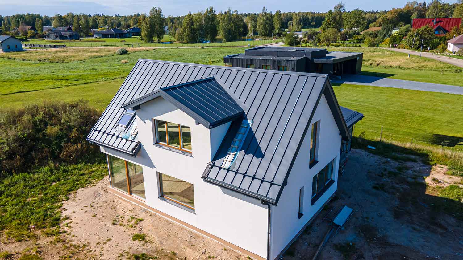Zinc roof installed on a modern house under construction
