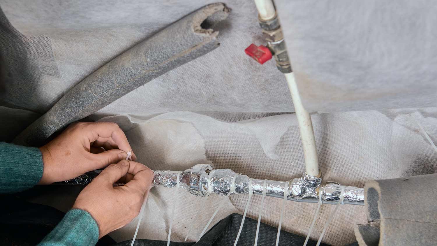 copper plumbing insulated with tape
