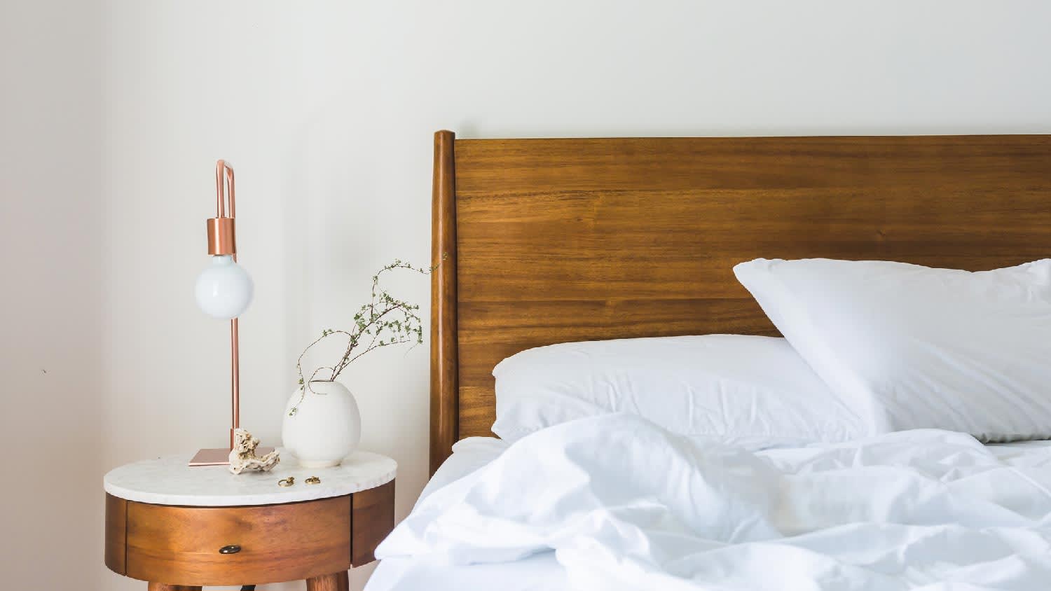 Detail of a white painted bedroom